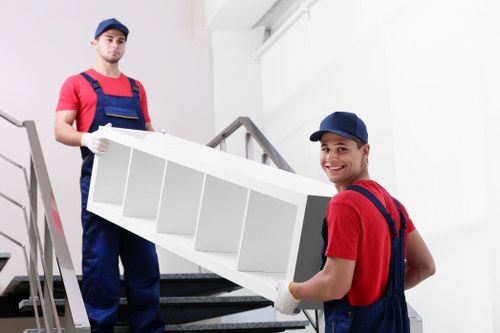 A Forestgate man and van handling boxes and household items