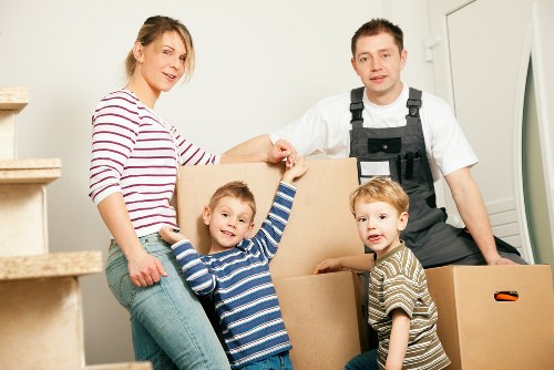 Assorted packing supplies including tape, wrap, and labels for local removals