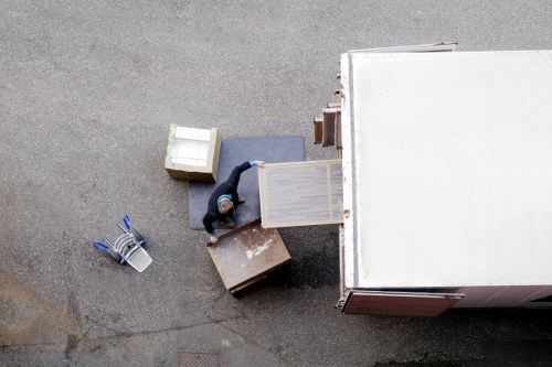 Local van service collecting furniture for delivery in Forestgate