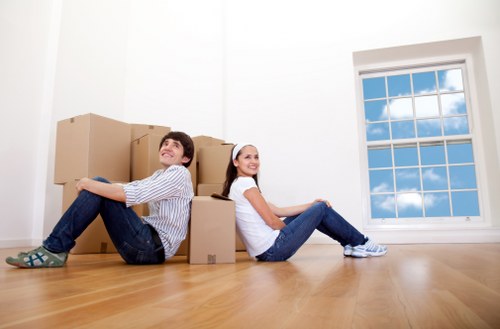 Packed boxes and furniture prepared for a Forestgate house move