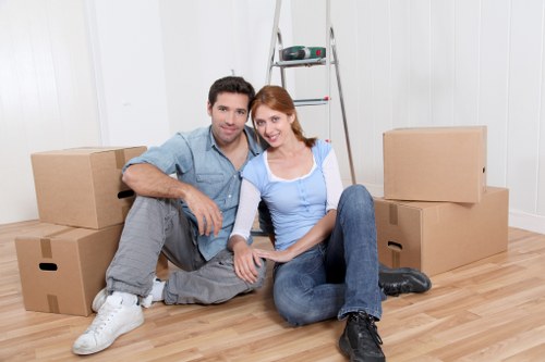 Commercial moving equipment and office items being loaded for same-day transport