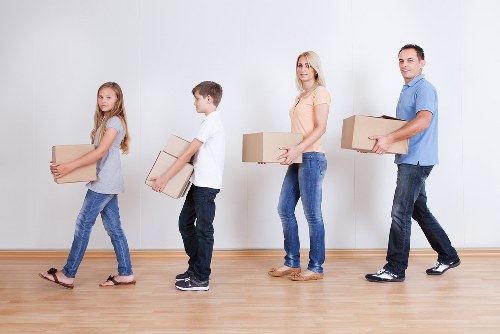 Careful loading of furniture for a student move in Forestgate
